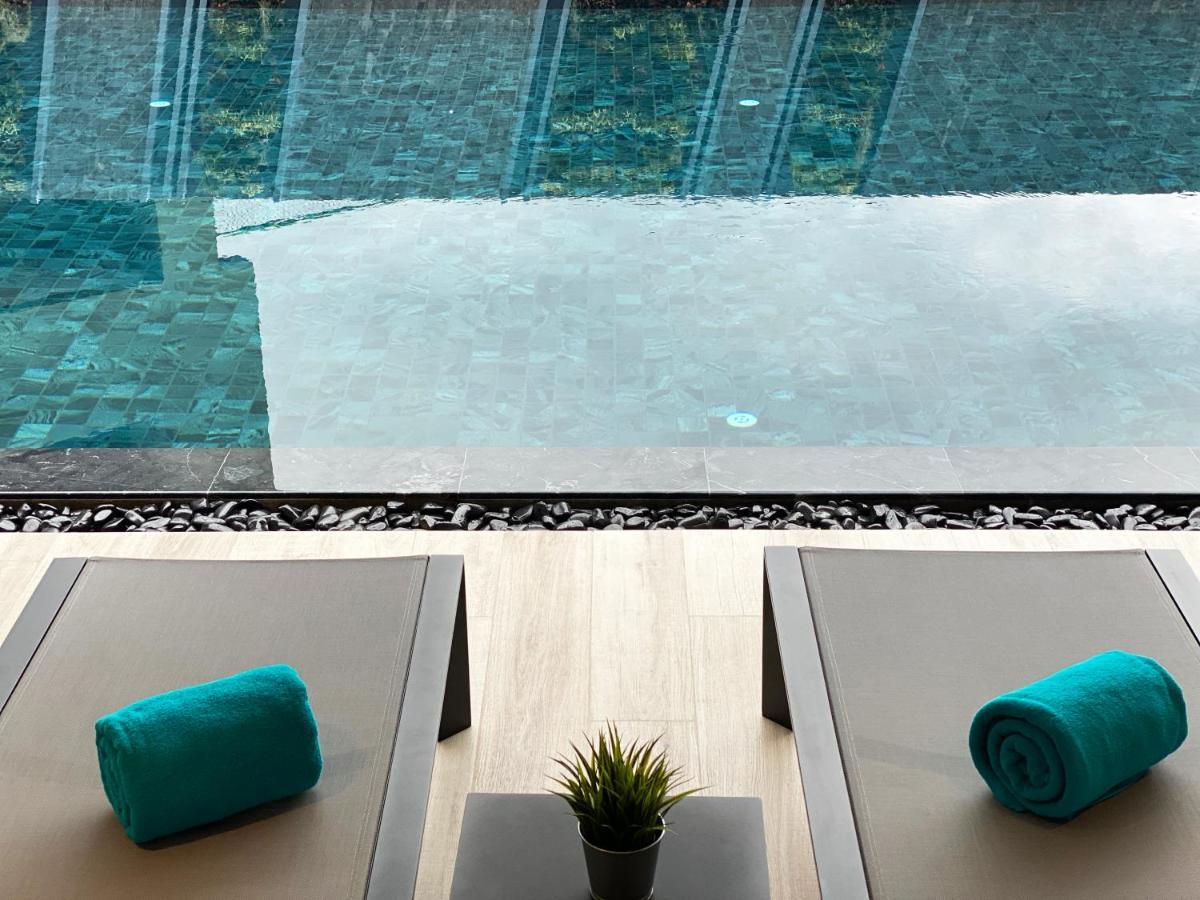 The Oceanic Sportel Phuket - Sha Extra Plus Екстериор снимка The swimming pool at the hotel