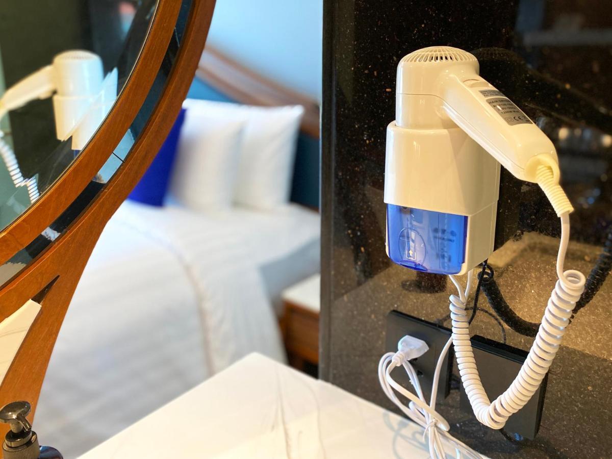 The Oceanic Sportel Phuket - Sha Extra Plus Екстериор снимка A hair dryer mounted on a wall